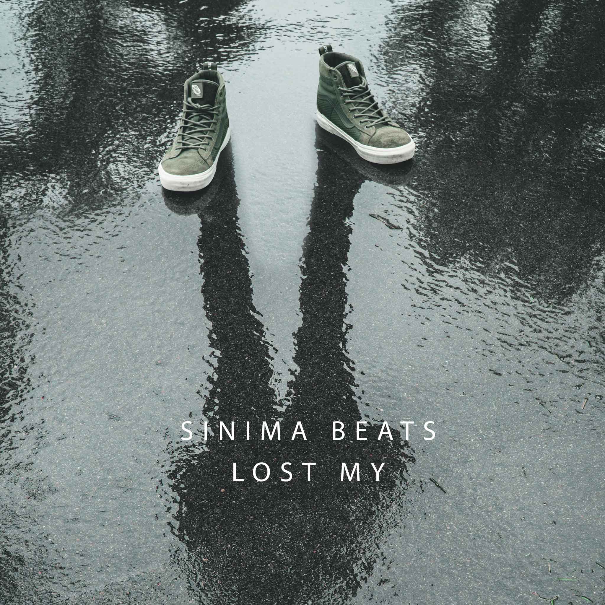 Shadow of a person reflected in a puddle on pavement, with shoes, symbolizing loss or mystery - Lost My Instrumental by SINIMA BEATS