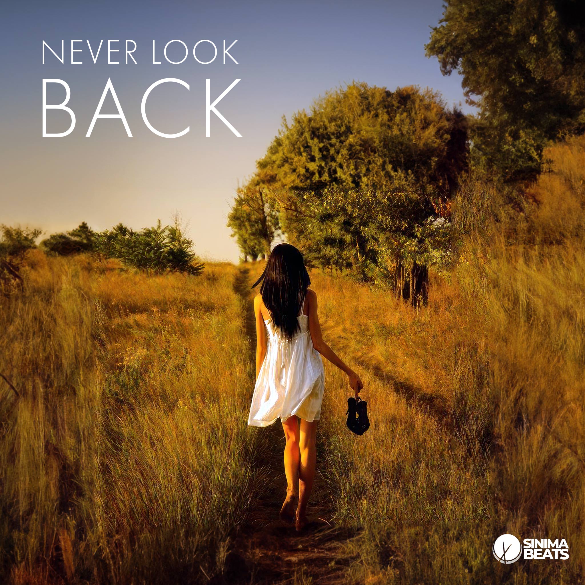 An attractive woman with black hair is walking barefoot through a grassy field beside a forest, holding black high heels by its strap with her finger. She is wearing a white skirt that contrasts with the lush greenery around her. The scene is captured in a way that embodies the phrase "Never Look Back," suggesting a forward-looking attitude and the idea of moving on from the past while embracing the present moment.
