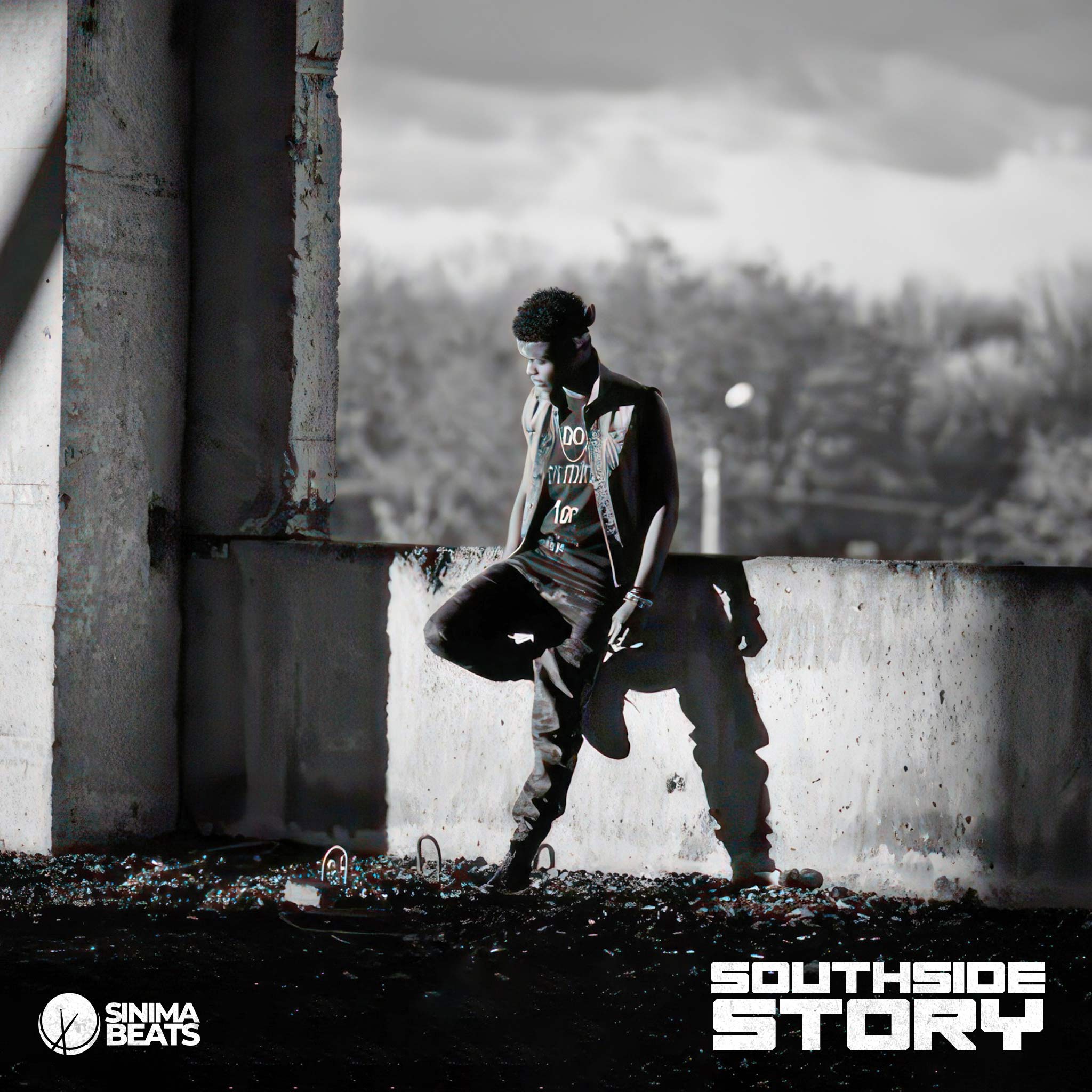 Urban style man wearing a bandana leans against a concrete platform with surrounding rocks, depicted in a grayscale image – Southside Story