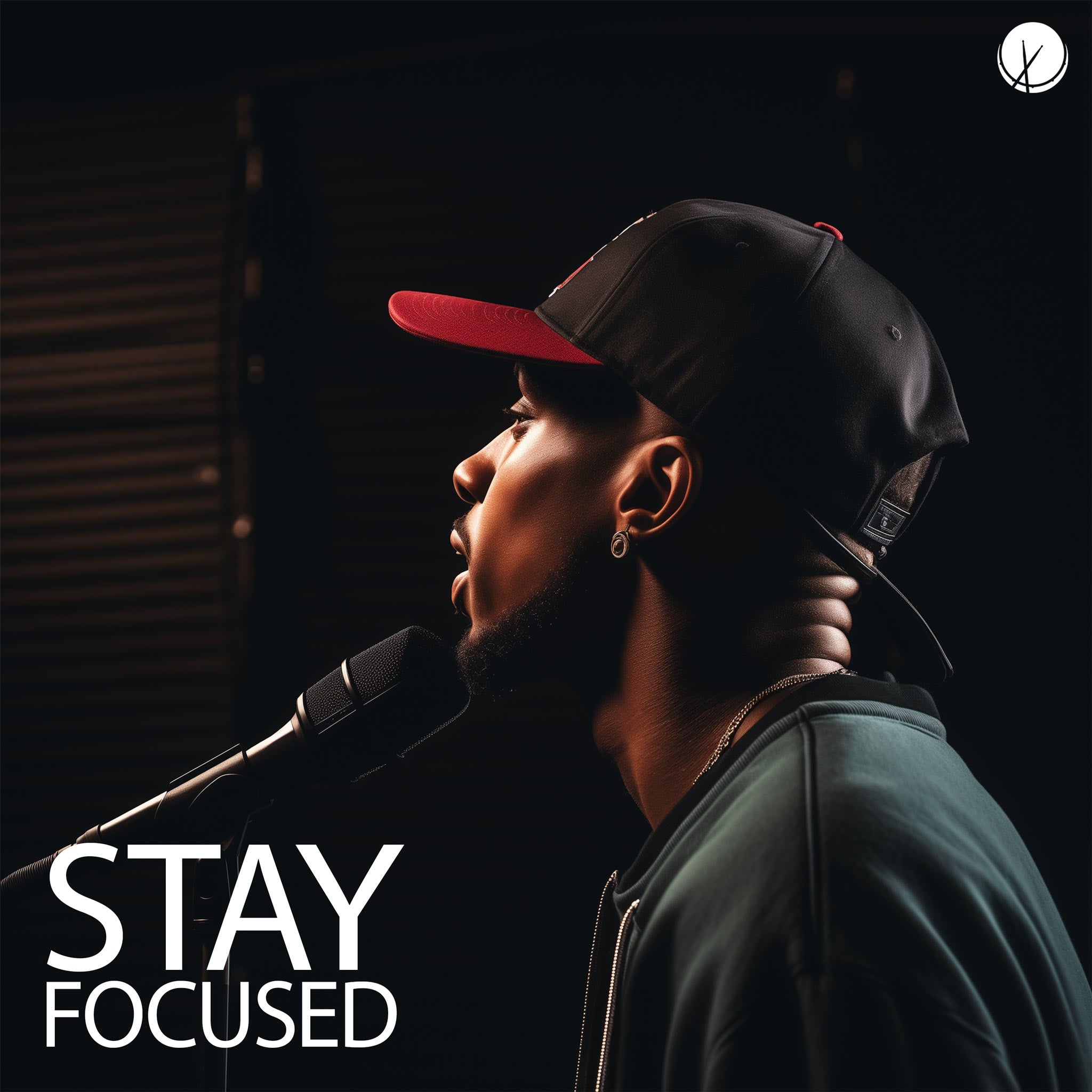 Focused scene titled "Stay Focused" featuring a black man in a baseball cap rapping into a microphone in a recording studio, capturing a moment of concentration and creativity.