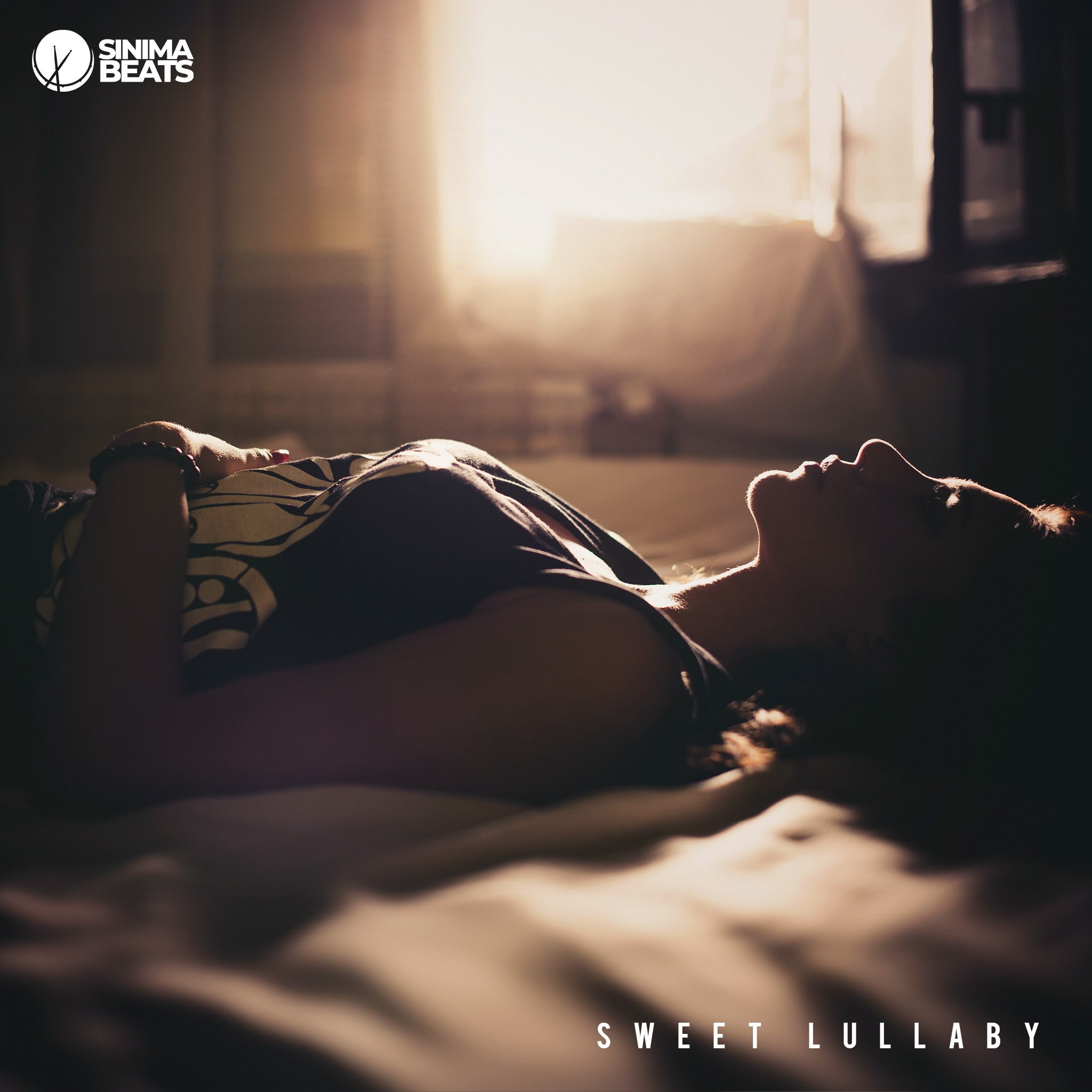 A young woman is seen laying back on a bed, facing the ceiling in a profile view. Soft light from a nearby window gently illuminates her face and surroundings, creating a serene and peaceful atmosphere. The image captures a moment of tranquility, evoking the soothing comfort of a "Sweet Lullaby."